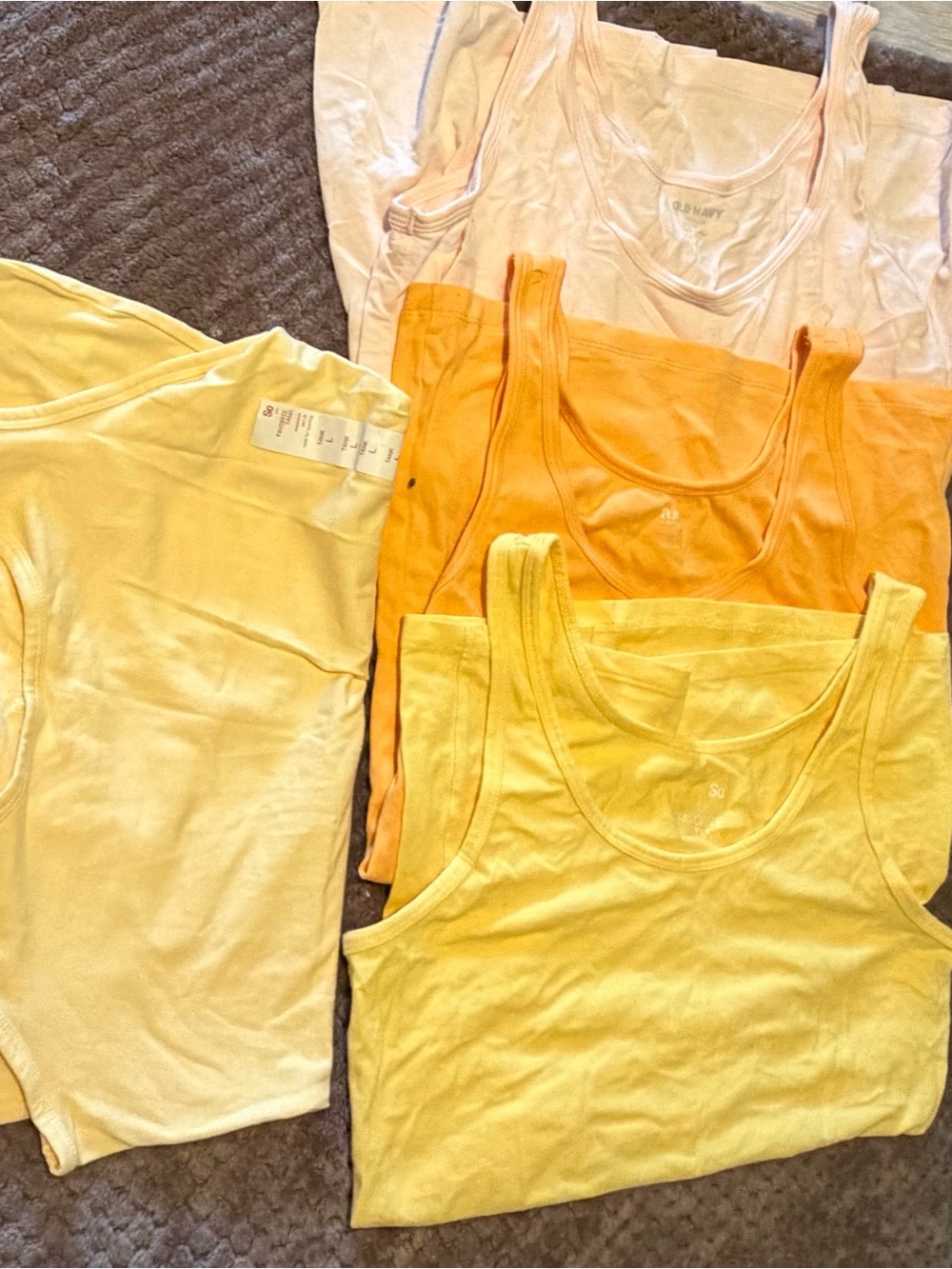 Women’s Tank Tops - Variety of colors. Some are ribbed fabric, some are smooth